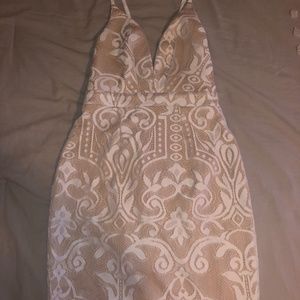 White and tan fitted dress and ties in the back